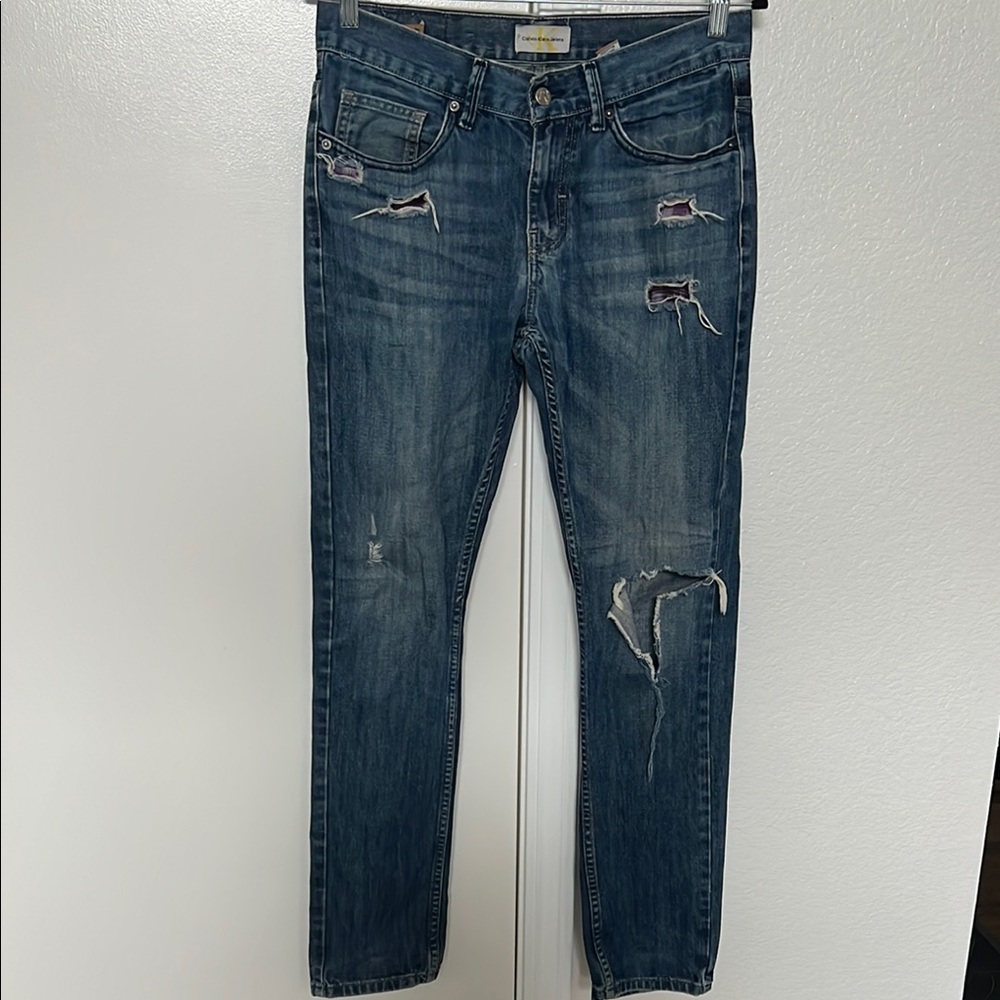 Distressed Blue Jeans
